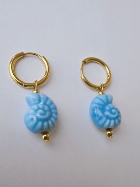 Gold Hoop Earrings with Blue Nautilus Shell Charms